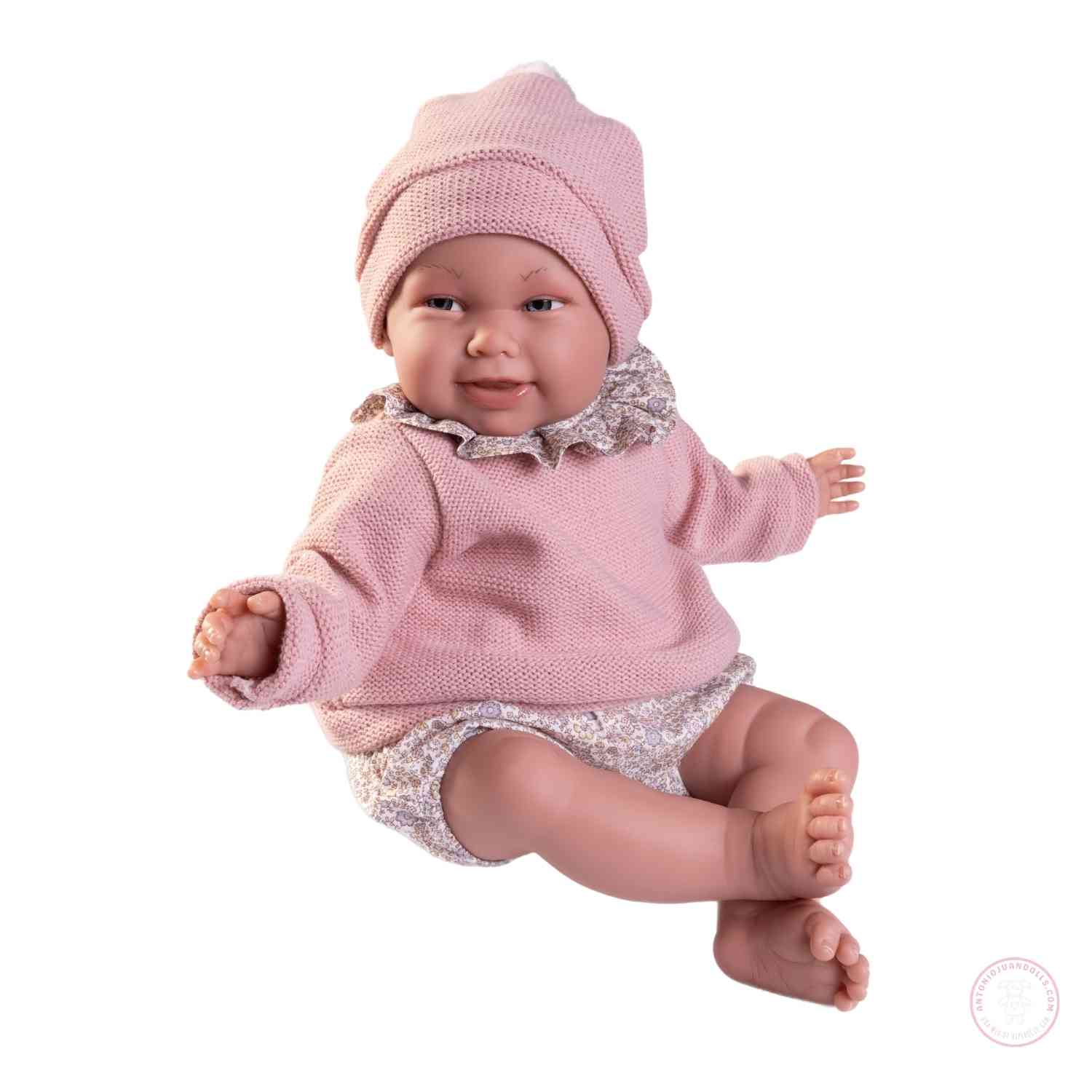 Reborn Martina con portabebé y gorro rosa