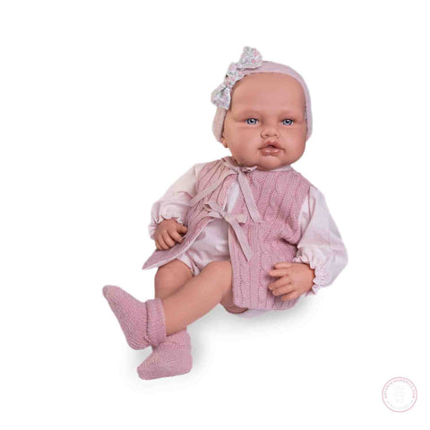 Babydoo con chaleco rosa y cojín

