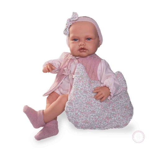 Babydoo posturitas con ropa rosa

