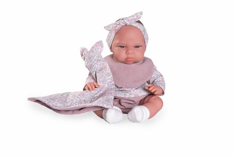 Detalle de cuerpo flexible de la muñeca Tufi

