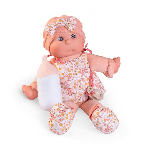 Detalle del biberón y chupete de la muñeca

