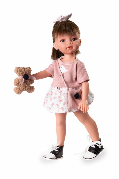 Muñeca Emily con falda estampada y camiseta rosa

