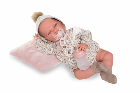 Muñeca recién nacida con pelele de flores y gorro


