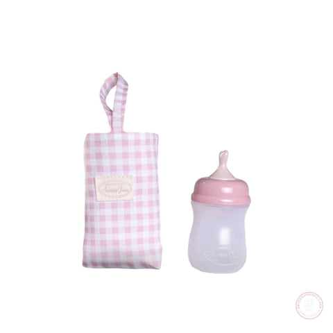 Portabiberones rosa con cuadritos Vichy y biberón


